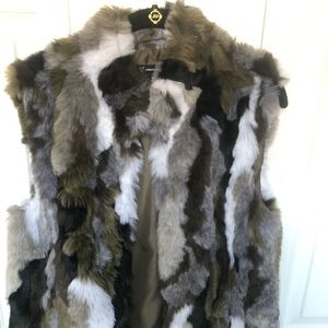 Faux Fur trendy multi-color vest.